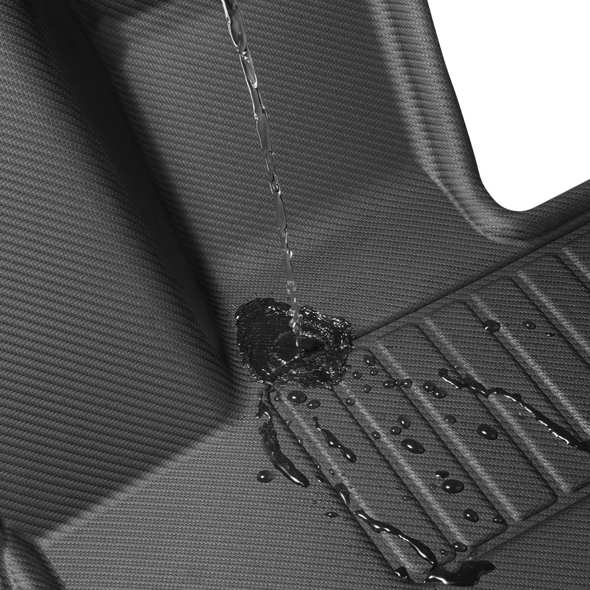 ACP08260 - Tesla Cybertruck WeatherBloc Floor Mat CLF in Black showing the waterproof feature