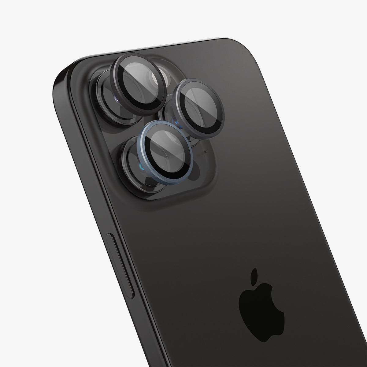 AGL06159 - iPhone 16 Pro / 16 Pro Max Optik Pro Lens Protector in zero one showing the lens protector hovering slightly in front of the camera lens